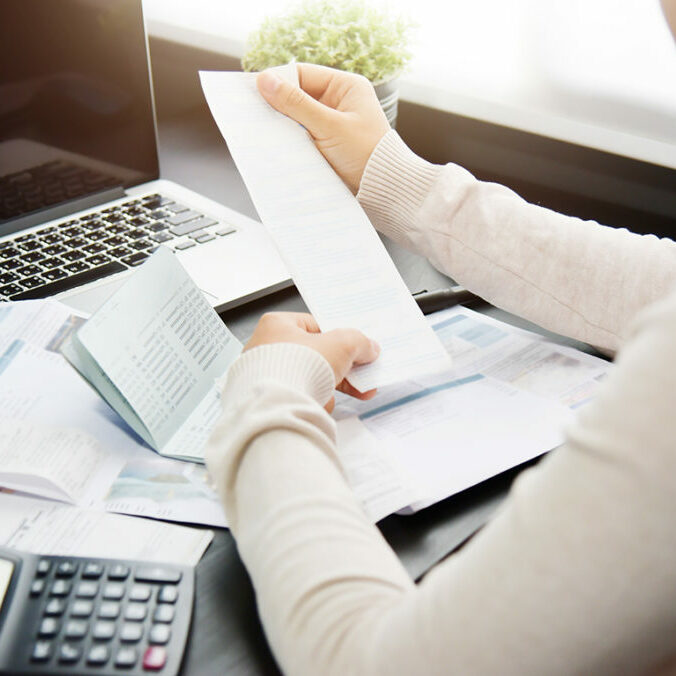 Woman calculating her Debt_